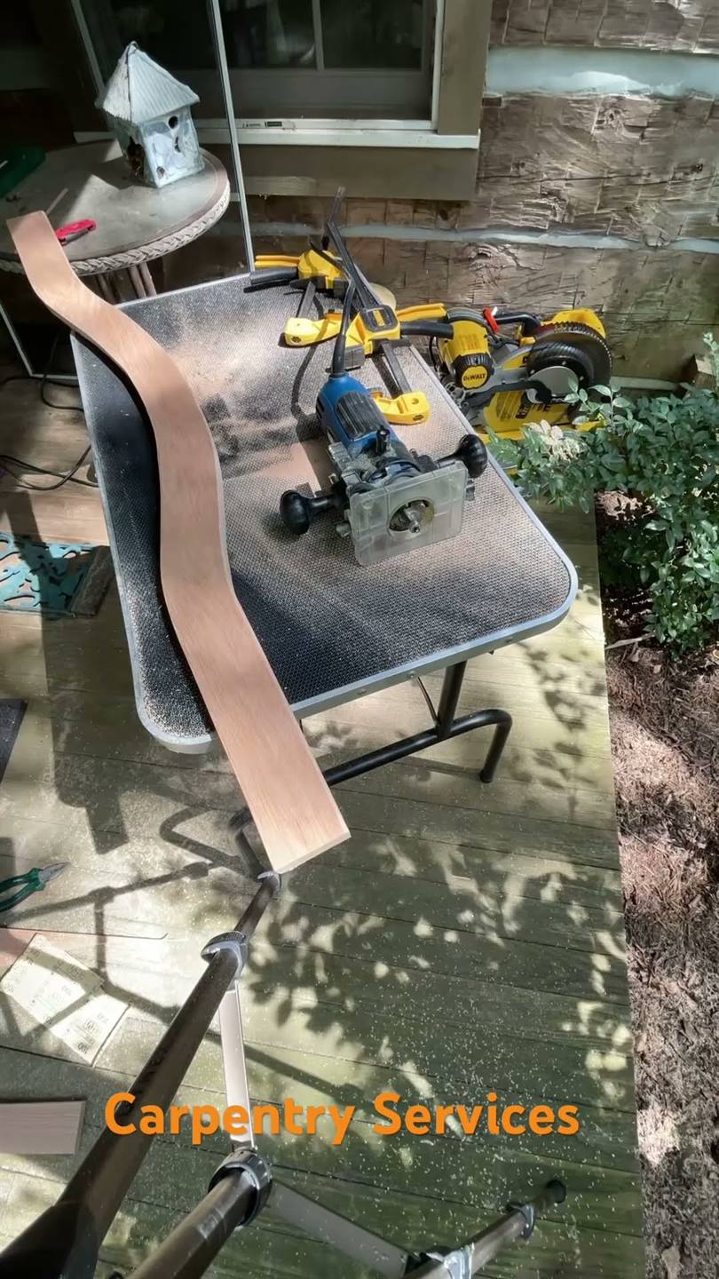 A mitre saw on a folding table outdoors, cutting a fresh timber slat for a bench